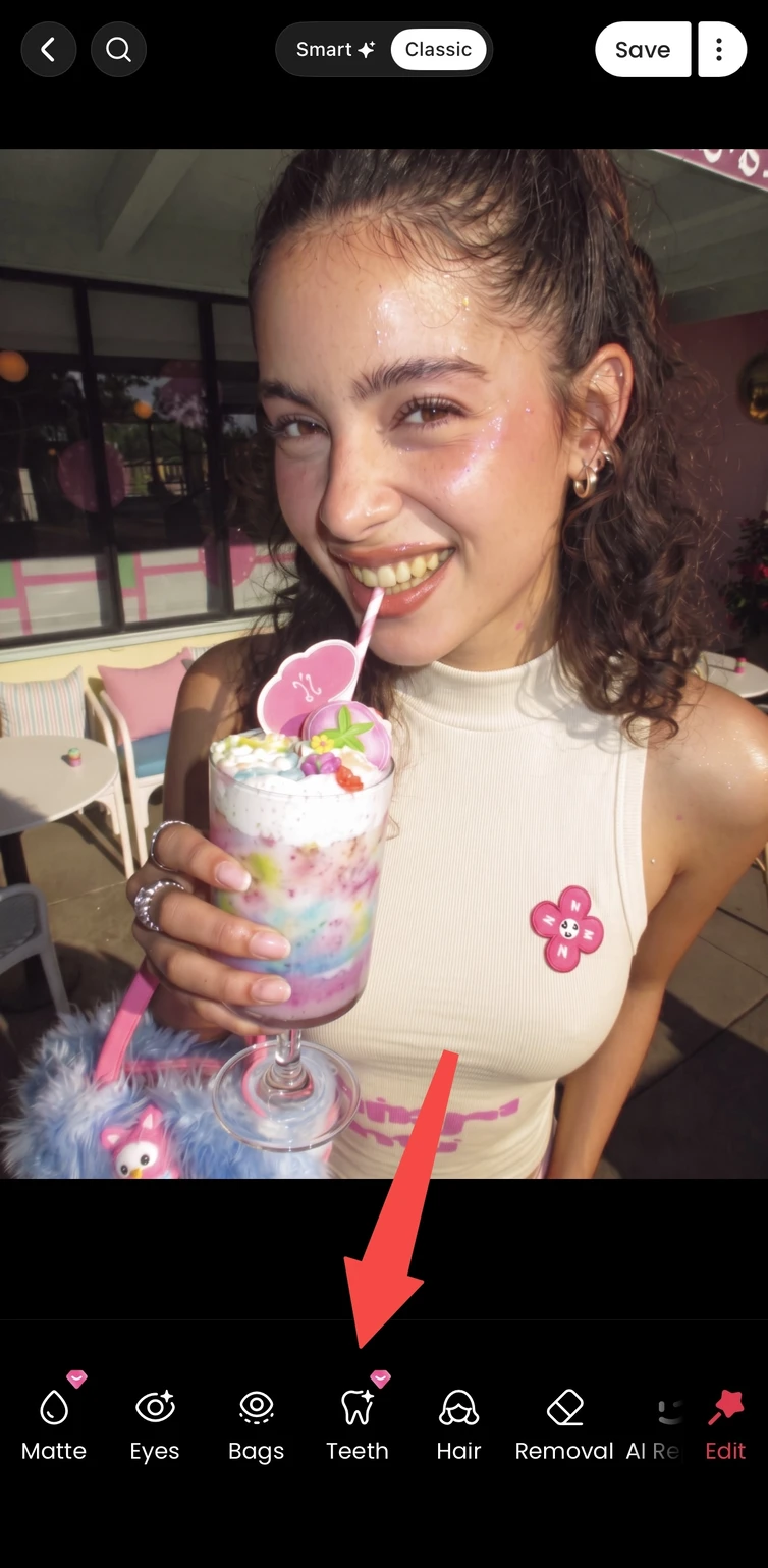 Meitu portrait editor with a smiling photo open and the teeth editing tool visible.